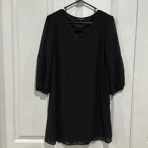 Polka Dot Dress! Black with 3/4 sleeves. Sleeves are see thru, dress is lined